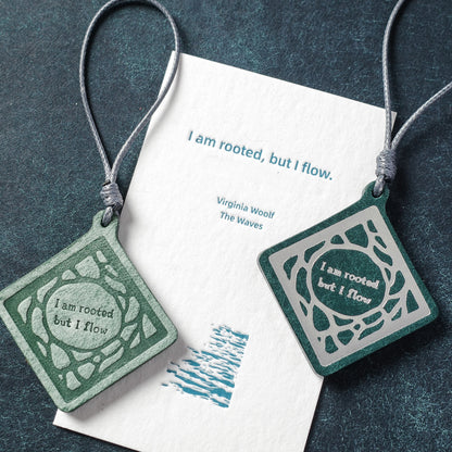 “I'm rooted but I flow”Leather Charm