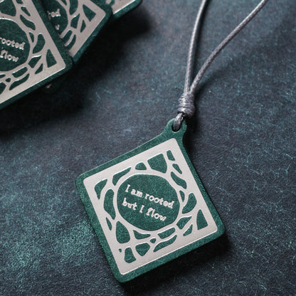 “I'm rooted but I flow”Leather Charm