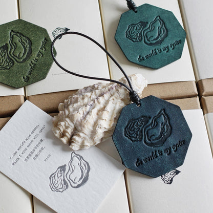 "The World Is My Oyster" Leather Charm