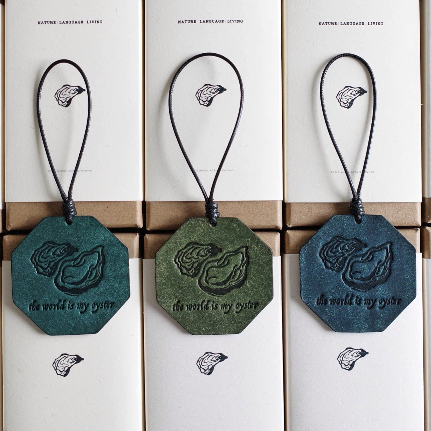 "The World Is My Oyster" Leather Charm